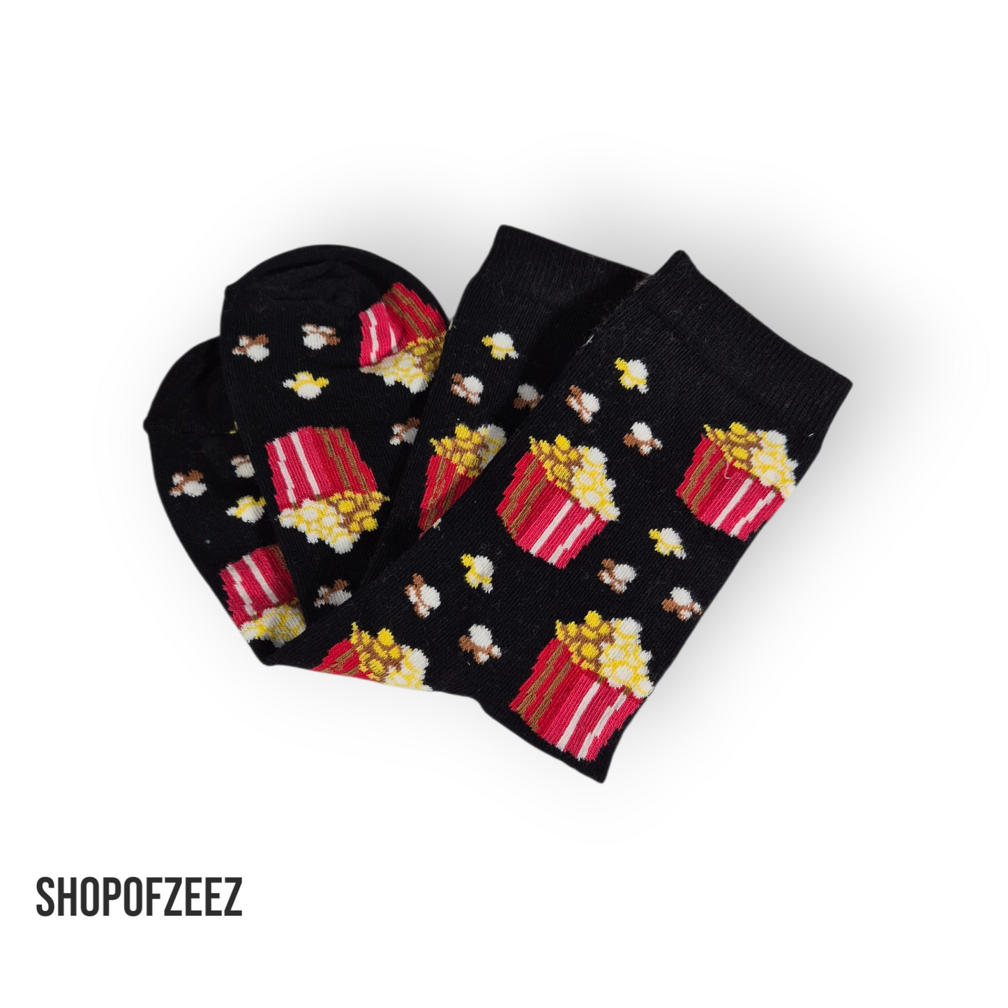 Popcorn-Motiv (Schwarz) – Rote Popcornboxen auf schwarzem Hintergrund