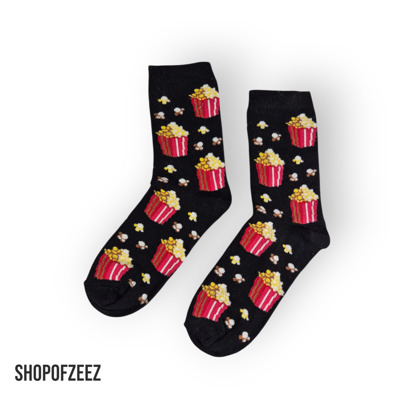 Popcorn-Motiv (Schwarz) – Rote Popcornboxen auf schwarzem Hintergrund