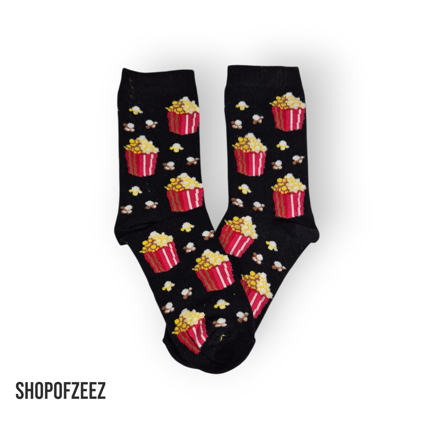 Popcorn-Motiv (Schwarz) – Rote Popcornboxen auf schwarzem Hintergrund