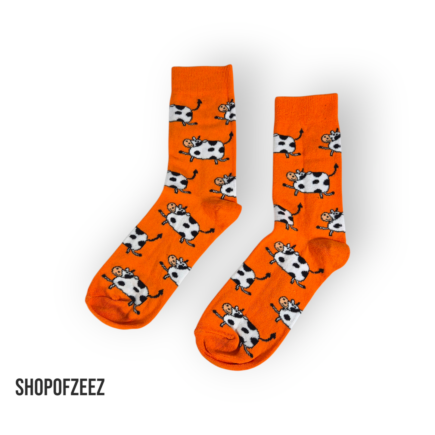 Orange mit Kühen Socken